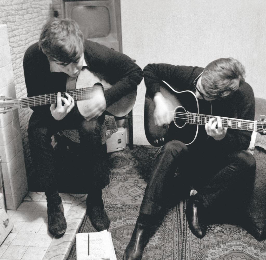 1962-04 Paul-with-John-Lennon-writing-I-Saw-Her.jpg