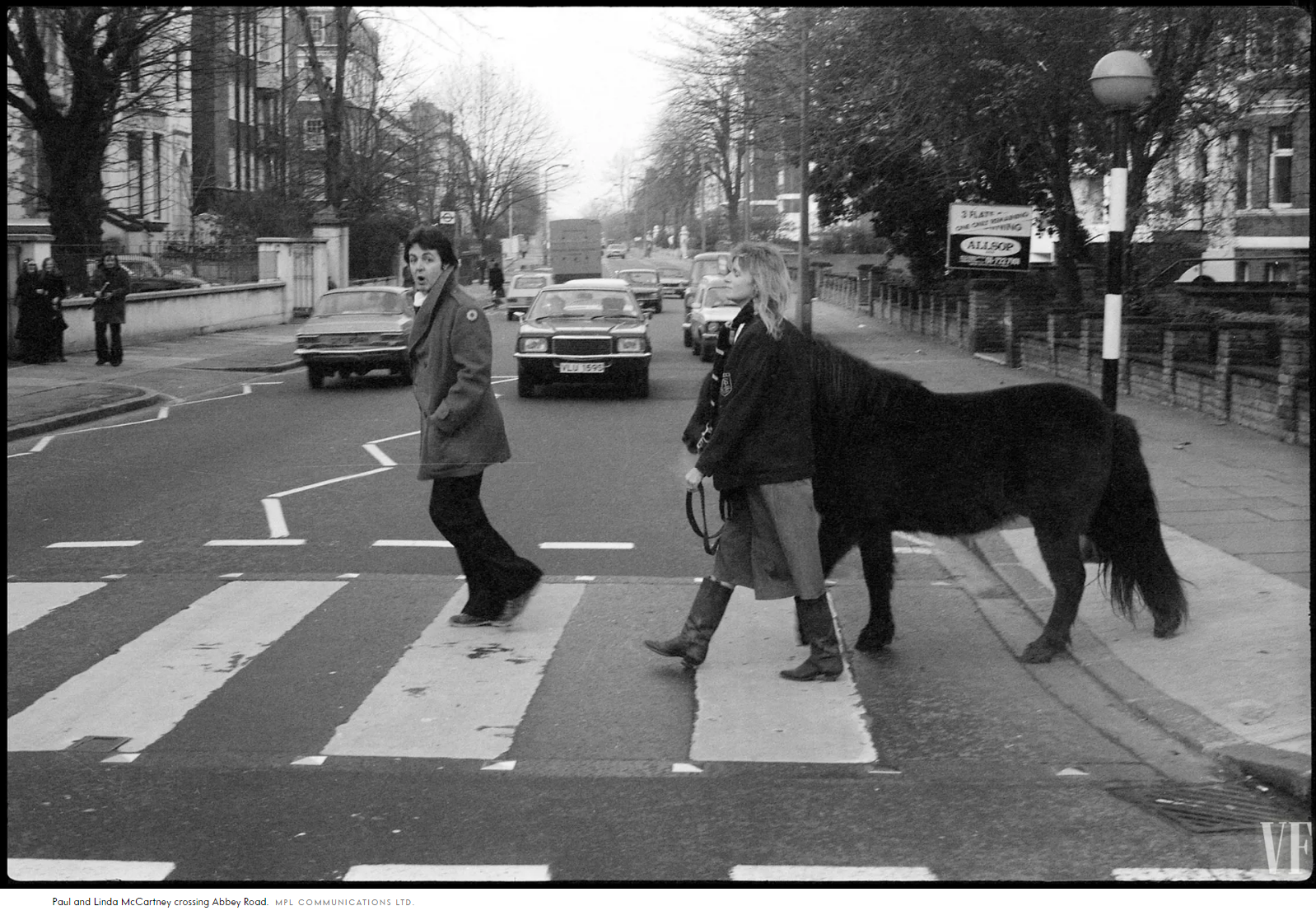 Paul and Linda crossing Abbey Road.png